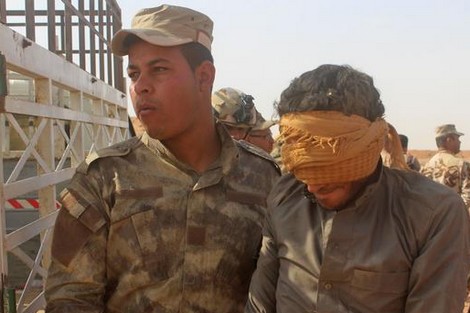 أمريكا تنقل مقاتلي داعش من سوريا إلى العراق