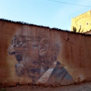 "دّا محمد الشافعي" .. رجل كشفت قطرات المطر صورته على الجدار