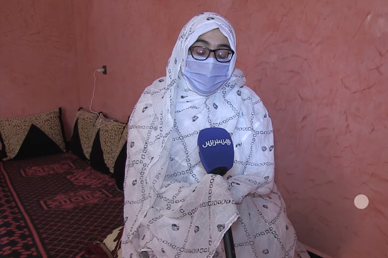 مع زوجة مغربي مغدور بمالي